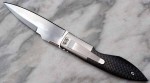 Customfolder von Brian Tighe mit Kohlefasergriffschalen